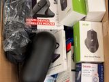 a cardboard box filled with different types of electronic devices