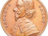 an image of a close up of a coin with a man ' s face