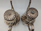 pair of antique silver plated teapots on stands