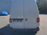 a white van that is parked in a parking lot