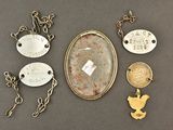 a close up of a group of jewelry on a table