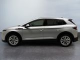 a picture of a silver suv parked in a parking lot