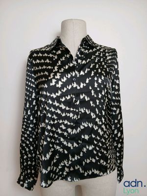 a black and white shirt with a pattern on it