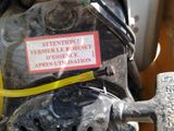 a sign on the engine of a tractor that says attention farmer robertt desse - ce apres uttification