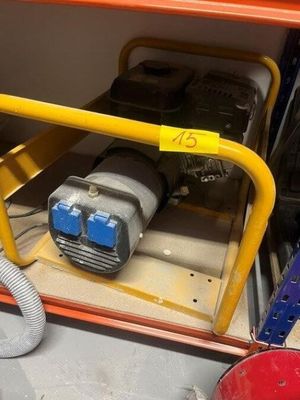 a machine that is sitting in the back of a truck