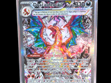 a close up of a pokemon card with a dragon on it