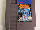 an image of a game cartridge with a picture of a face on it