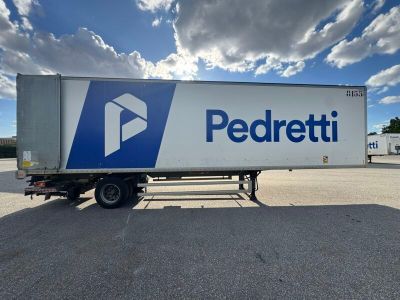 a semi truck that is parked in a parking lot