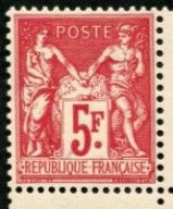 un timbre représentant deux femmes se serrant la main