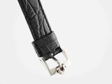 a close up of a watch strap on a white background