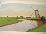 a picture of a book with a picture of a windmill