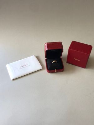 a close up of a box with a ring inside of it