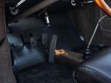 a close up of the inside of a car with a steering wheel