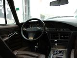 a picture of a car with a dashboard and a steering wheel
