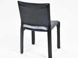 black leather dining chair on a white background with a white background