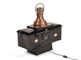 a lamp that is sitting on top of a box