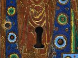 an image of a close up of a keyhole on a wall