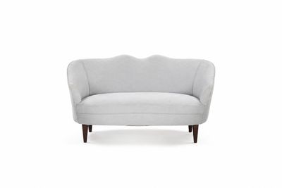 an image of a white couch sitting on top of a white floor