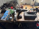 a table with a bunch of tools on it