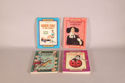 quatre livres pour enfants sont alignés sur une surface blanche