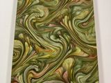 a painting of green and yellow swirls on a white surface