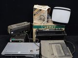 a lot of electronics that are sitting on a table