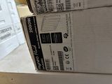 two boxes stacked on top of each other on a shelf