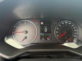 a close up of a car dashboard with a speedometer and gauges