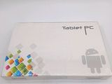 a tablet pc sitting on top of a white table
