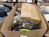 many boxes of clothes and other items in a store