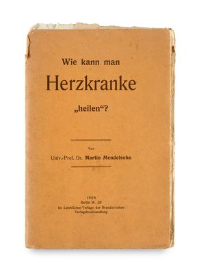 an old book with german writing on it sitting on a white surface