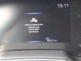 a picture of the dashboard of a car with a message on it