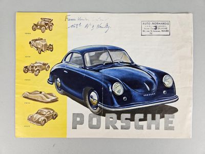 a picture of a blue car on display on the wall