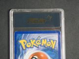 the pokemon game is in a plastic case on a table