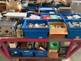 many boxes of assorted items sitting on a table
