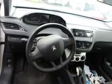 dashboard of a car with a steering wheel and dashboard controls
