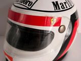 a close up of a helmet on a white surface