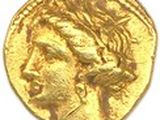 une pièce d'or sur laquelle est représentée la tête d'une femme