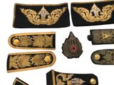 a lot of different types of military uniforms on a white background