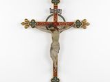 a wooden crucif with a cross on it and a cross on the wall