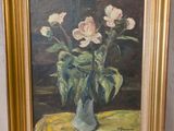 une peinture de fleurs dans un vase sur une table