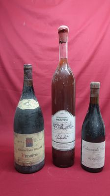 three bottles of wine are lined up on a red background