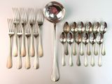 a lot of silver spoons and forks on the table
