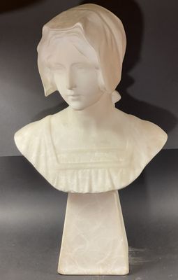 white marble bust of a woman with a turban on her head