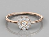 a close up of a rose cut diamond ring on a reflective surface