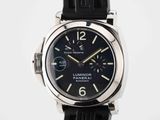 the watch is black with a black dial and black rubber strap