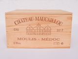 wooden box with a logo of chateau macallaou on it