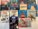 de nombreux livres pour enfants qui se trouvent sur la table