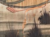 a painting on the wall of a building with a bird flying over it