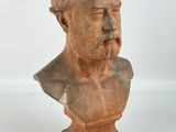 statue of a bust of a man with a beard on a white background
